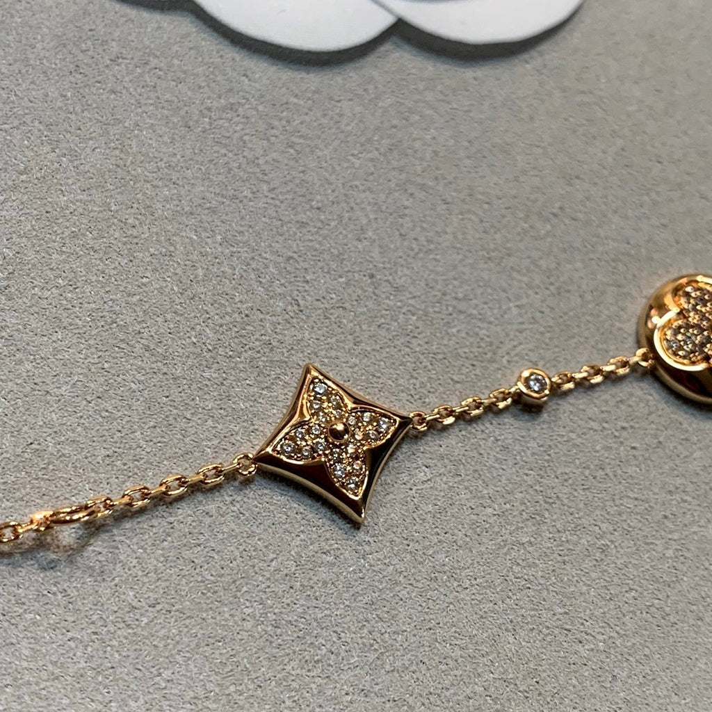 ¡®Imperial¡¯STAR AND SUN 4 MOTIFS GOLD DIAMONDS BRACELET