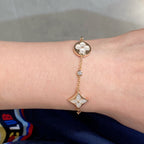 ¡®Imperial¡¯STAR AND SUN 4 MOTIF WHITE MOP PINK GOLD BRACELET