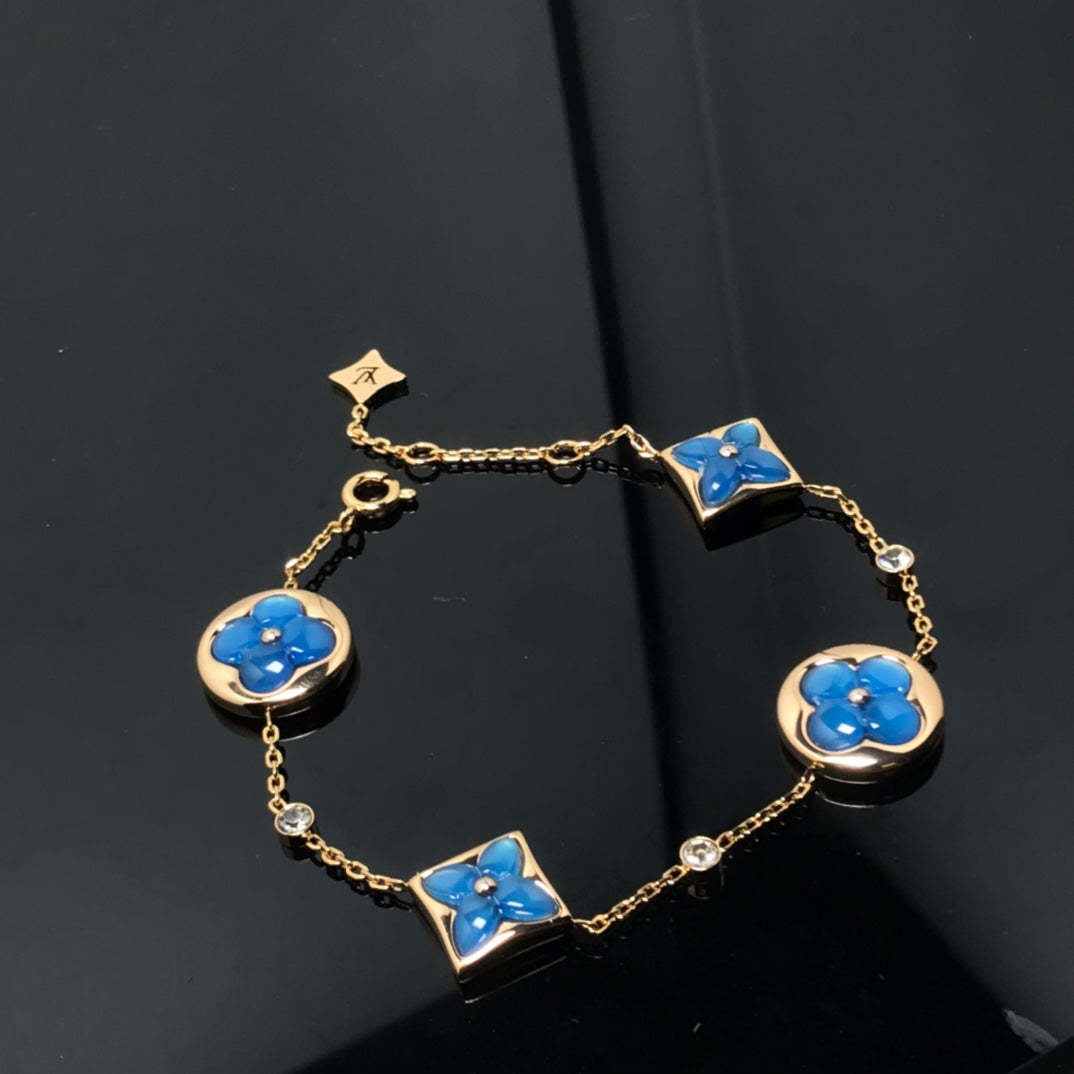 ¡®Imperial¡¯STAR AND SUN 4 MOTIF BLUE BRACELET