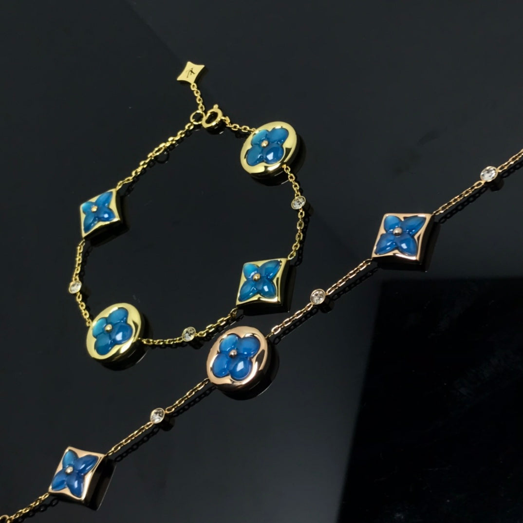 ¡®Imperial¡¯STAR AND SUN 4 MOTIF BLUE BRACELET